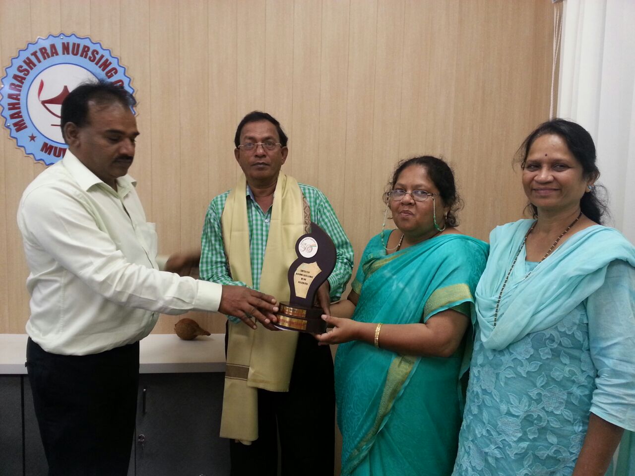 Felicitating of Dr. Chavan, Deputy Director of Health Services